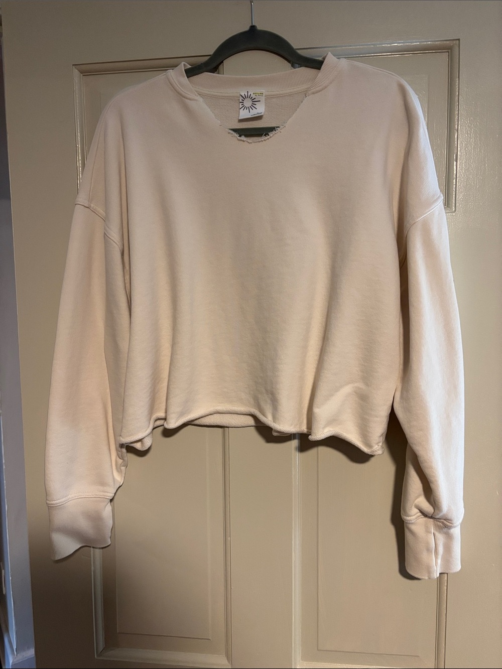 Offline by Aerie Cropped Raw-Hem Crewneck Sweatshirt in Light Cream
